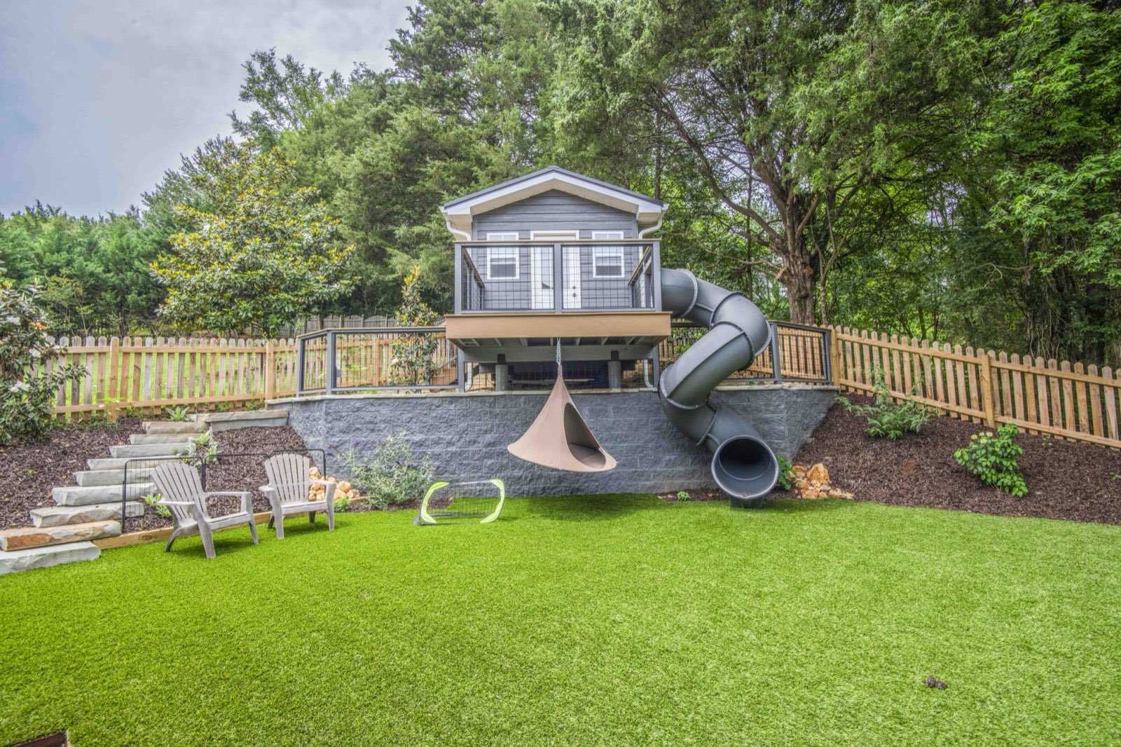Play structure and retaining wall after renovation